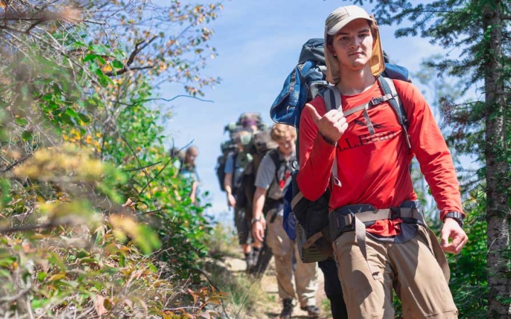 young adults backpacking in the boundary waters
